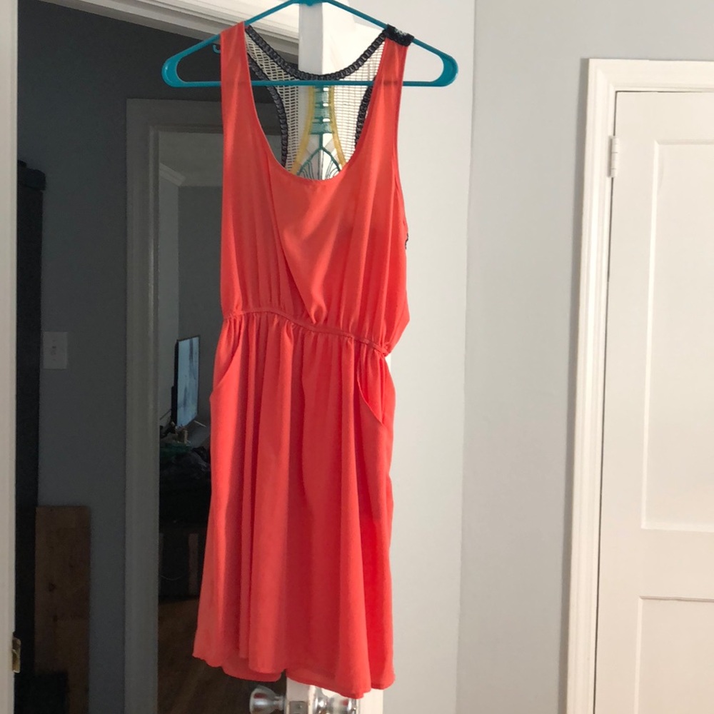 Short dress. Has pockets. Worn twice.